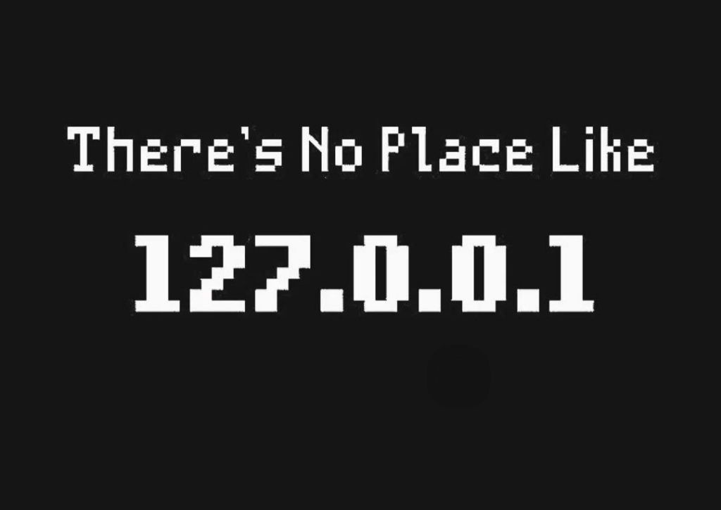 A black background displays white pixelated text reading 'There's No Place Like 127.0.0.1'. The font resembles old computer…