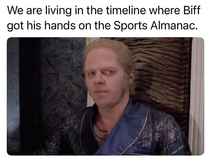 A still image of the character Biff Tannen from the 'Back to the Future' film series, looking smug and self-satisfied. He…