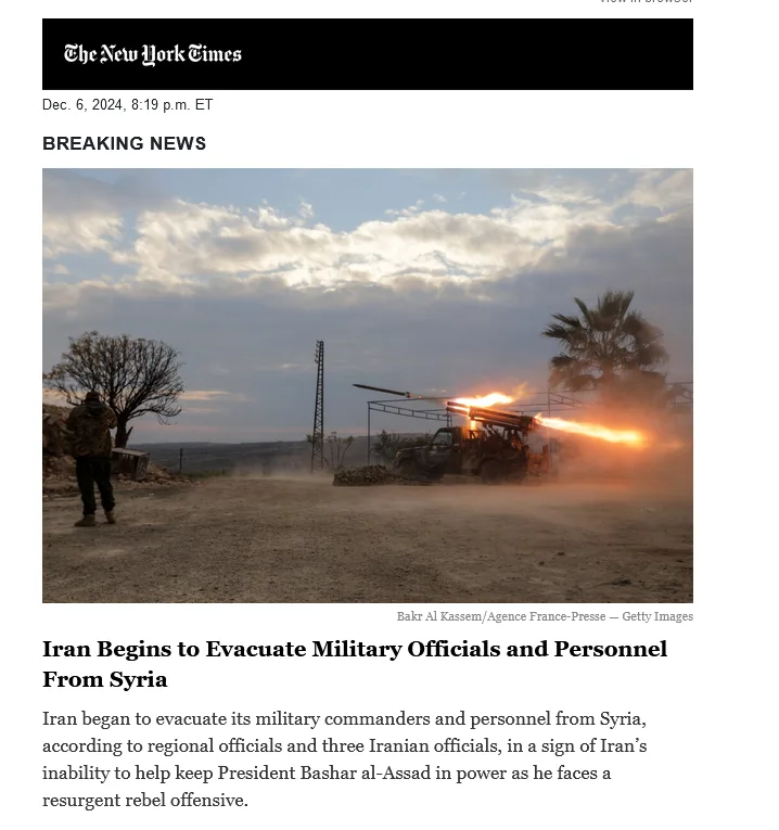 A screenshot of a New York Times breaking news article dated Dec 6, 2024, featuring a photo of a military vehicle firing a…