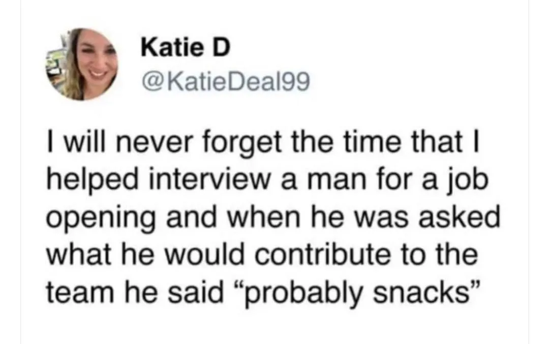 A screenshot of a tweet by Katie D (@KatieDeal99) showing her smiling profile picture. The tweet text recounts a job…