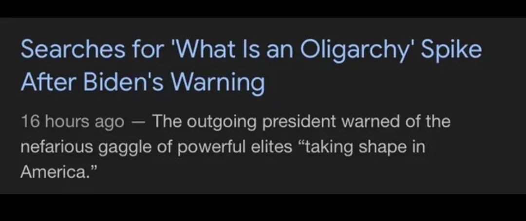 A screenshot of a news headline on a dark background with light blue and white text. The headline reads 'Searches for 'What…