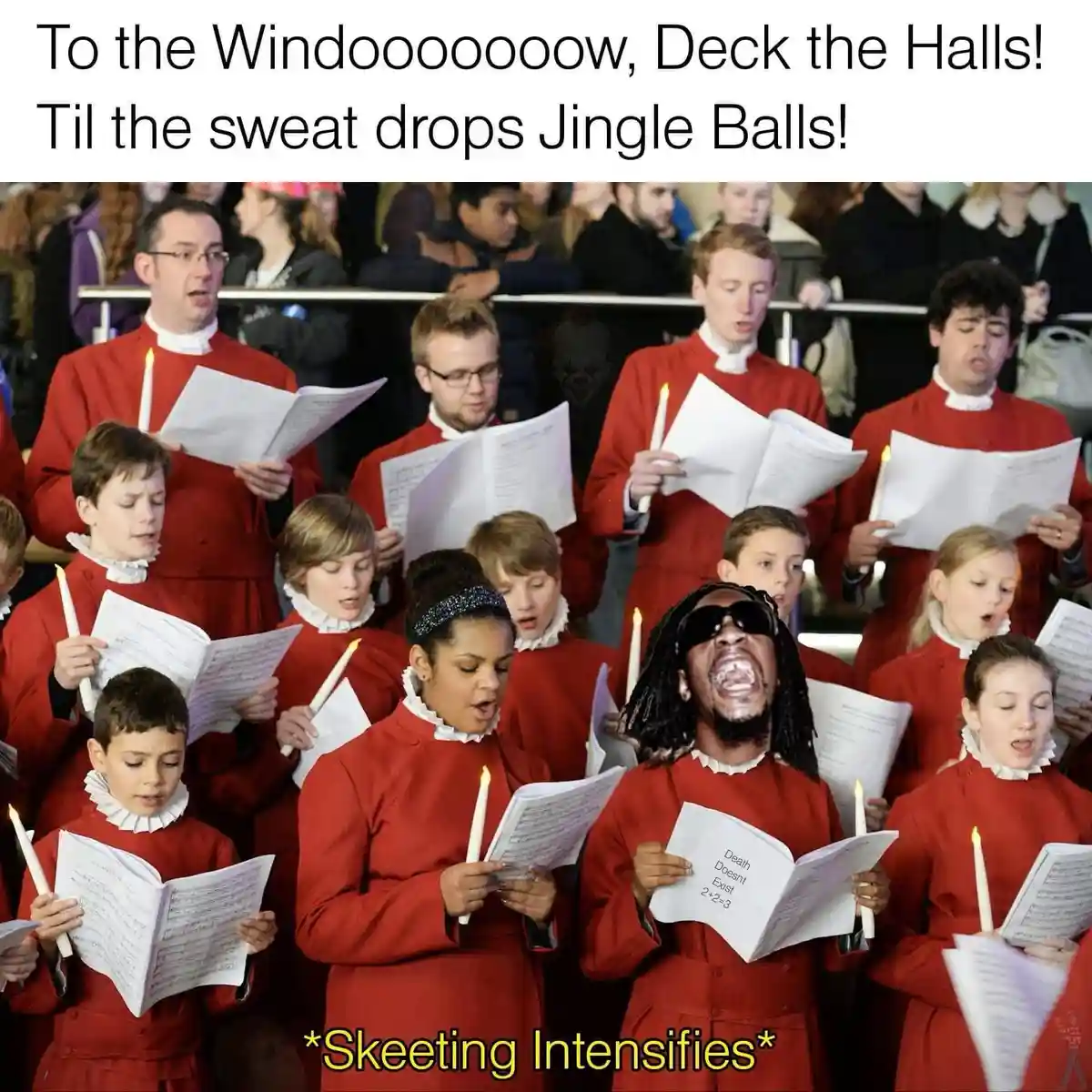 A choir of children and adults in red robes holding sheet music and candles sing with varying expressions. One man in the…
