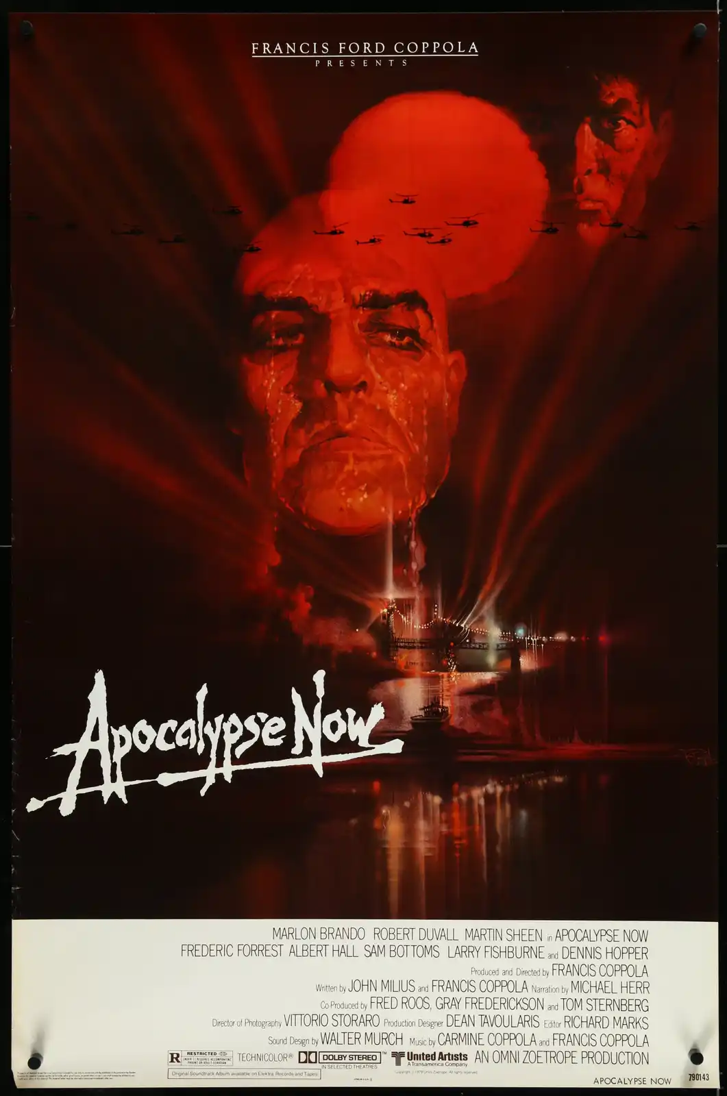 This is the original movie poster for 'Apocalypse Now,' featuring a large, red-tinted image of Marlon Brando's character…