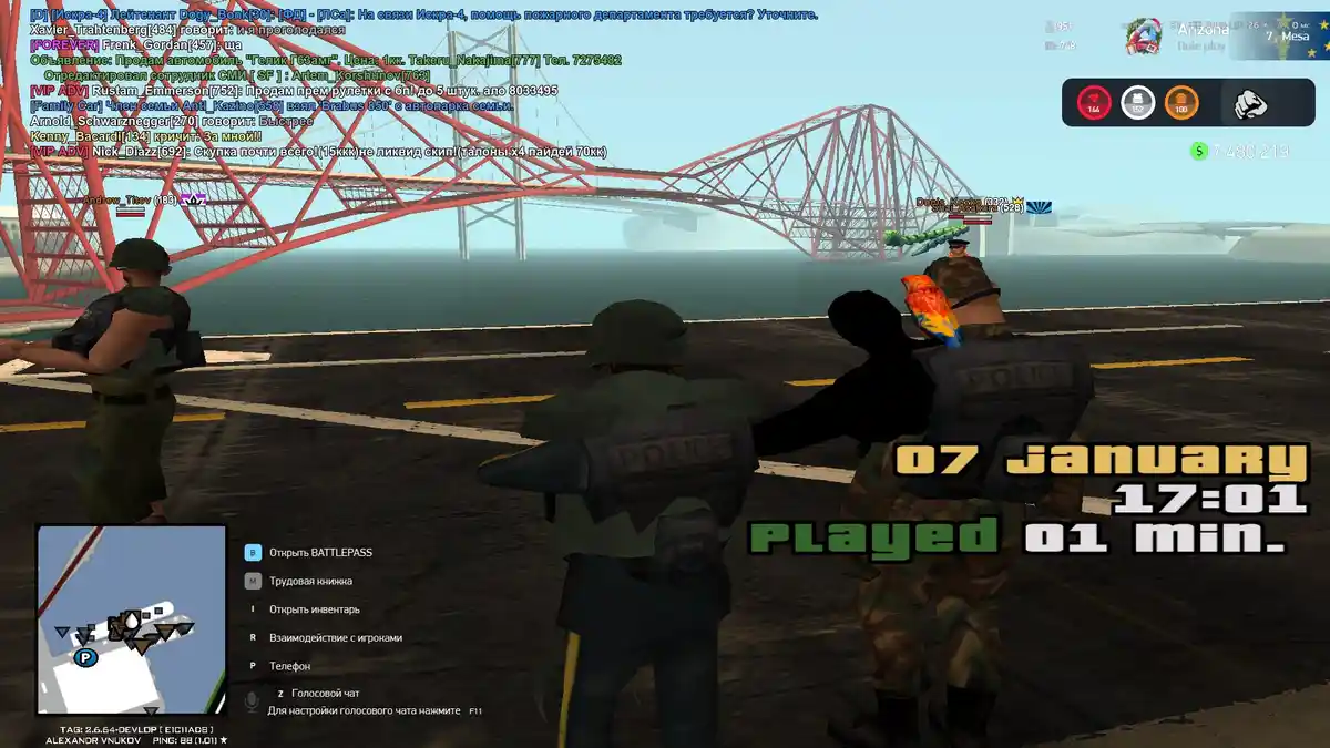 A screenshot from the game GTA San Andreas shows three police officers standing on a bridge with a large red bridge in the…