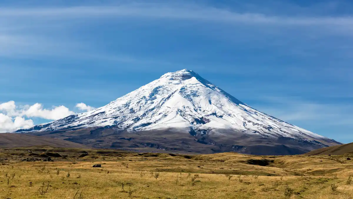Cotopaxi, the second-highest summit in Ecuador, stands at 19,347 feet, rising above Andean foothills in the Ring of Fire. As…