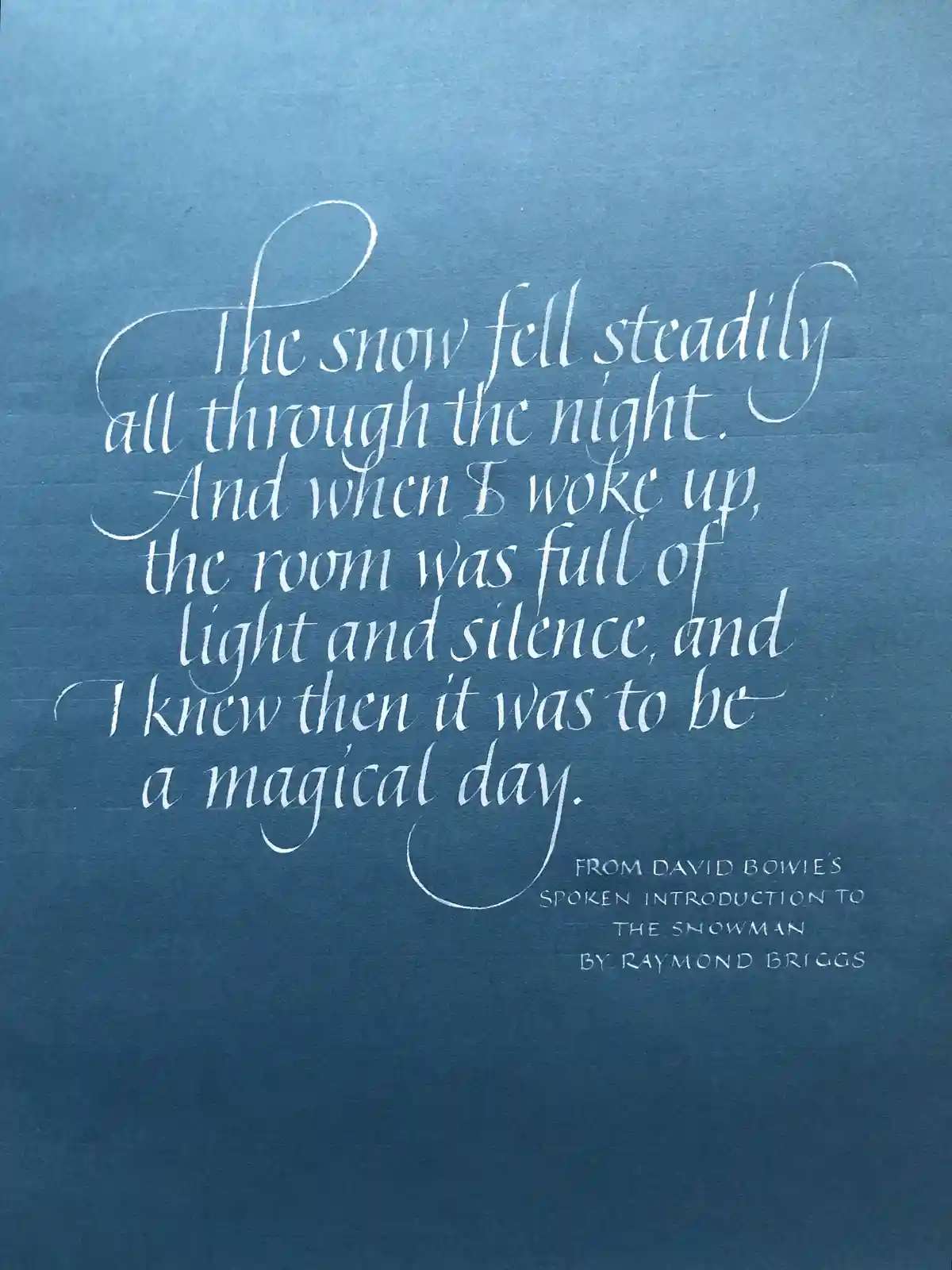 A blue textured background features elegant white calligraphy text quoting David Bowie's spoken introduction to Raymond…