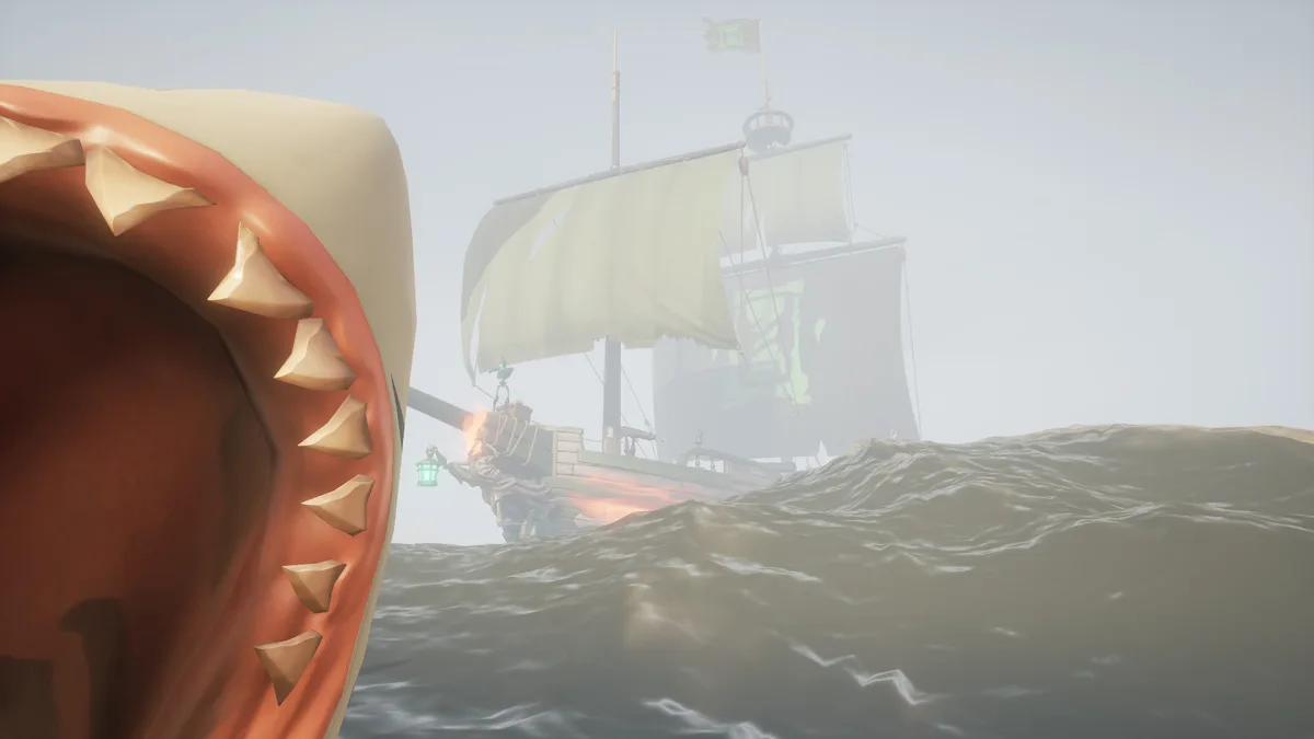 A screenshot from a video game shows a massive, open-mouthed kraken with sharp teeth on the left, facing a distant pirate…