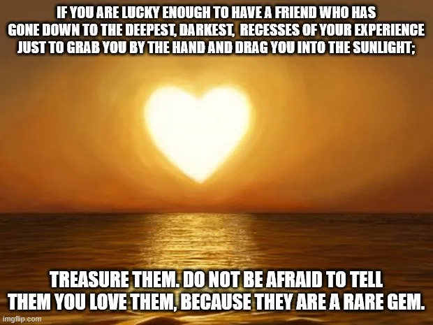 A heart-shaped sun rises over a calm ocean, casting golden light on the water. White text is overlaid in two blocks: the top…
