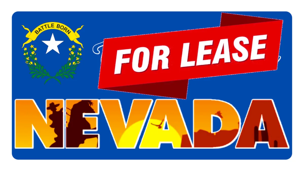 A blue sign features the Nevada state flag emblem on the left, with a red banner across the center reading 'FOR LEASE' in…