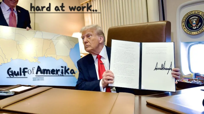 A man in a suit and red tie sits at a desk holding an open document with a signature, looking serious. Behind him, a large…
