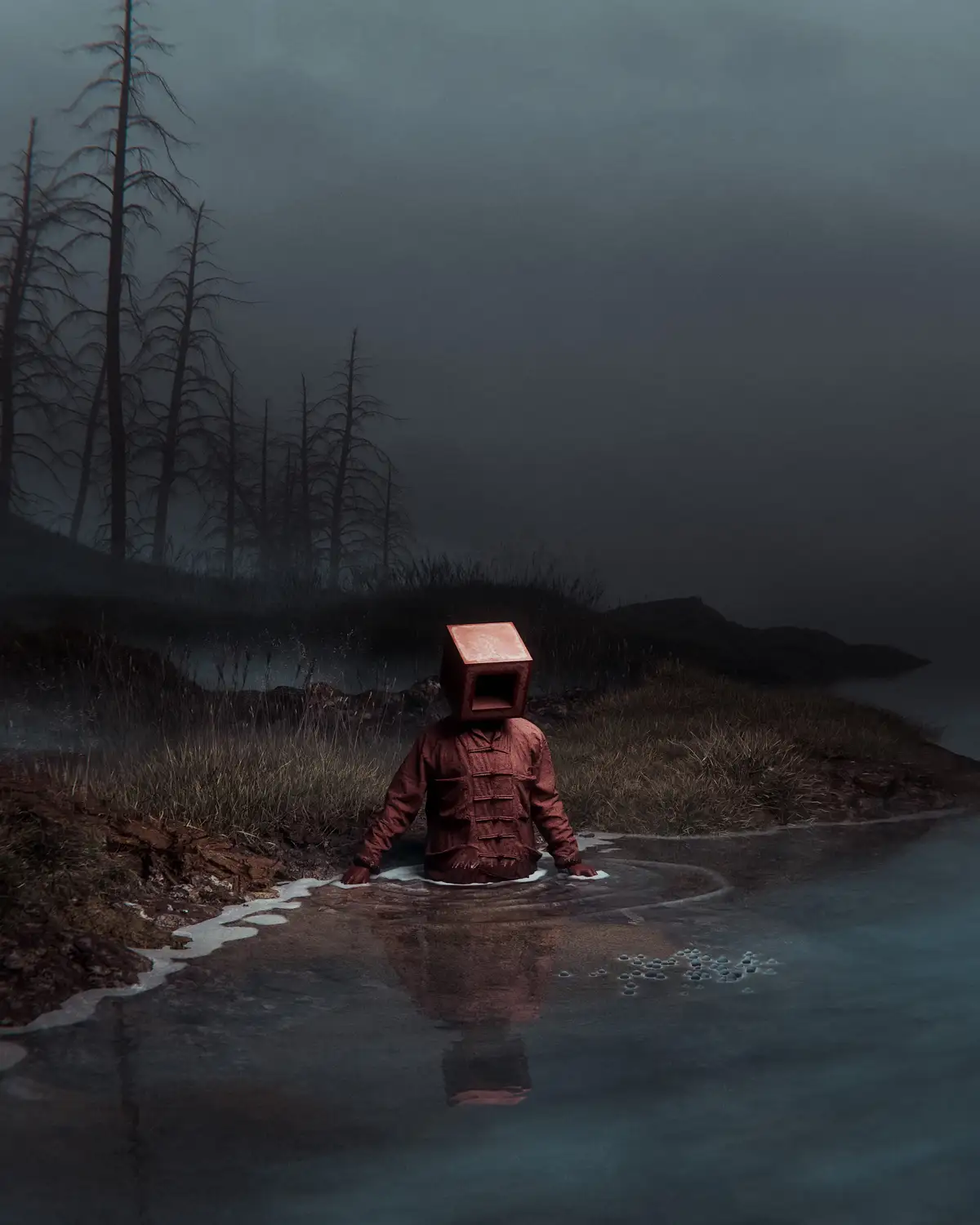 A person with a red, hollow cube for a head, wearing a traditional red jacket, stands waist-deep in murky water at the edge…