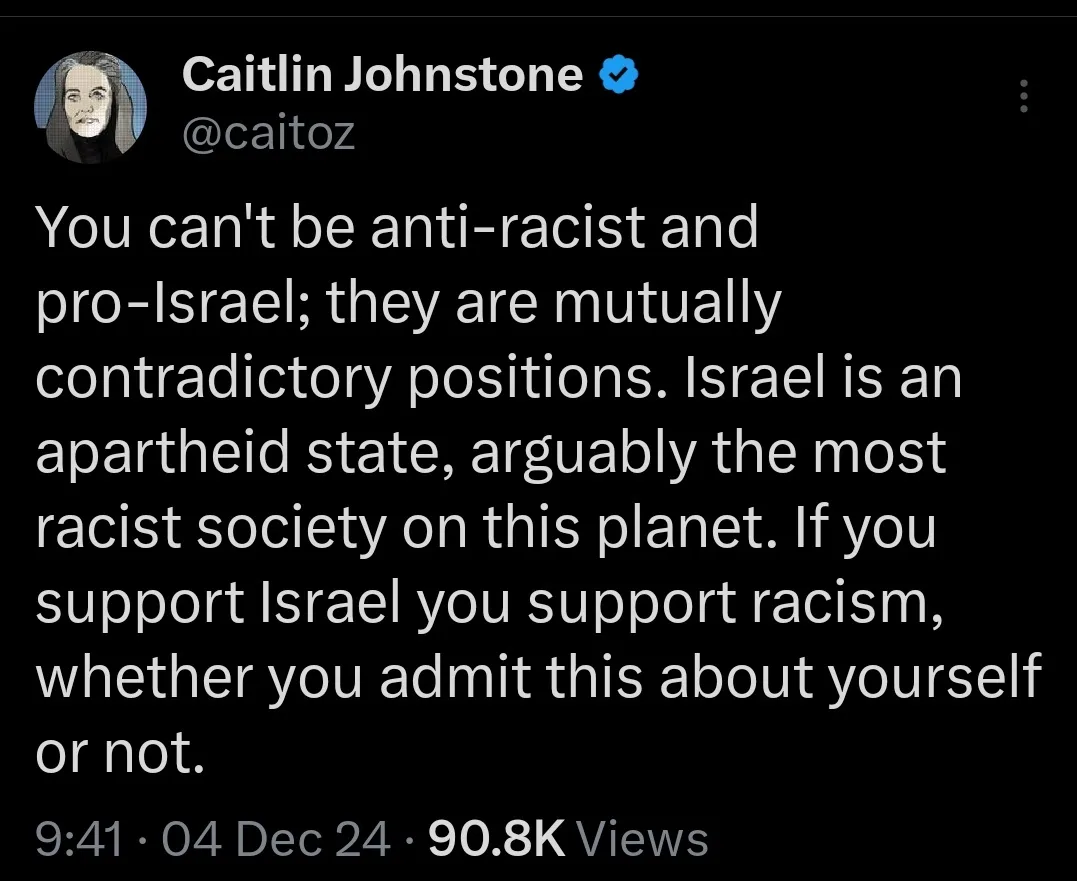 A screenshot of a tweet by verified user Caitlin Johnstone (@caitoz) with a black background and white text. The tweet…
