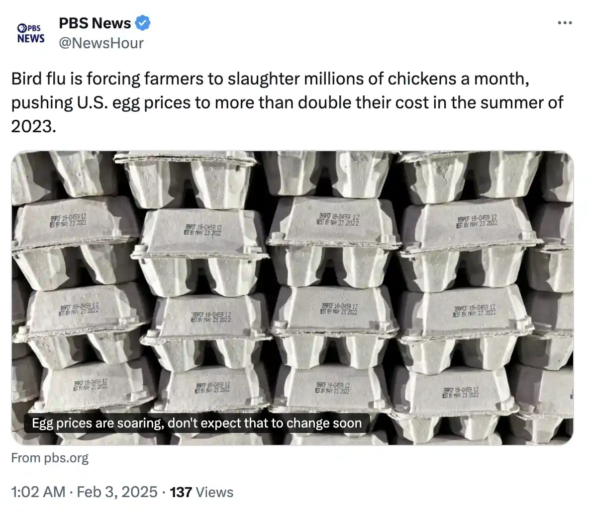A screenshot of a PBS News tweet showing stacks of egg cartons with 'BEST BY MAY 23 2022' dates printed on them, overlaid…