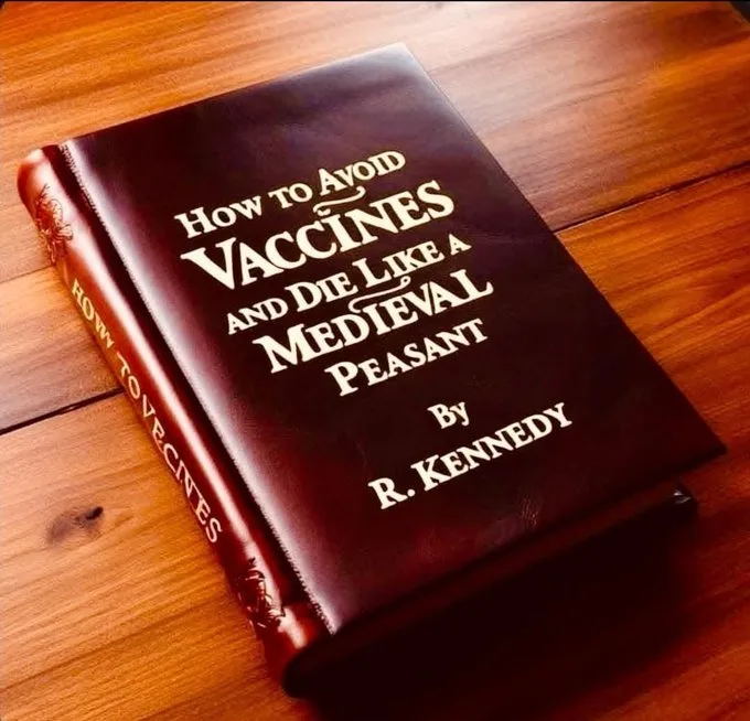 A dark brown leather-bound book titled 'How to Avoid Vaccines and Die Like a Medieval Peasant' by R. Kennedy rests on a…