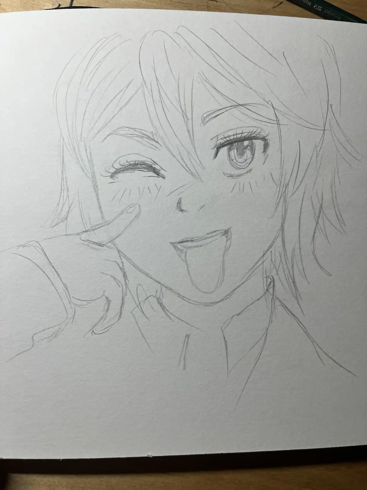 A pencil sketch of an anime-style character with one eye closed and the other wide open, sticking out their tongue playfully…