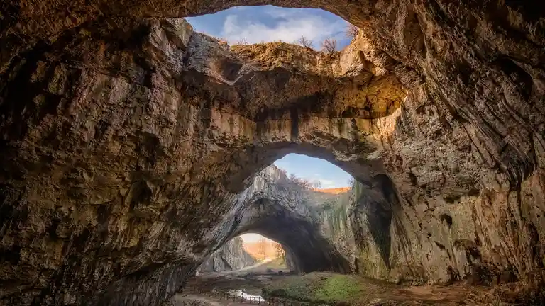 In the DevetÃÂ shka Cave, once a stone age dwelling in Bulgaria, 30,000 bats now thrive in the depths. This ancient cave…