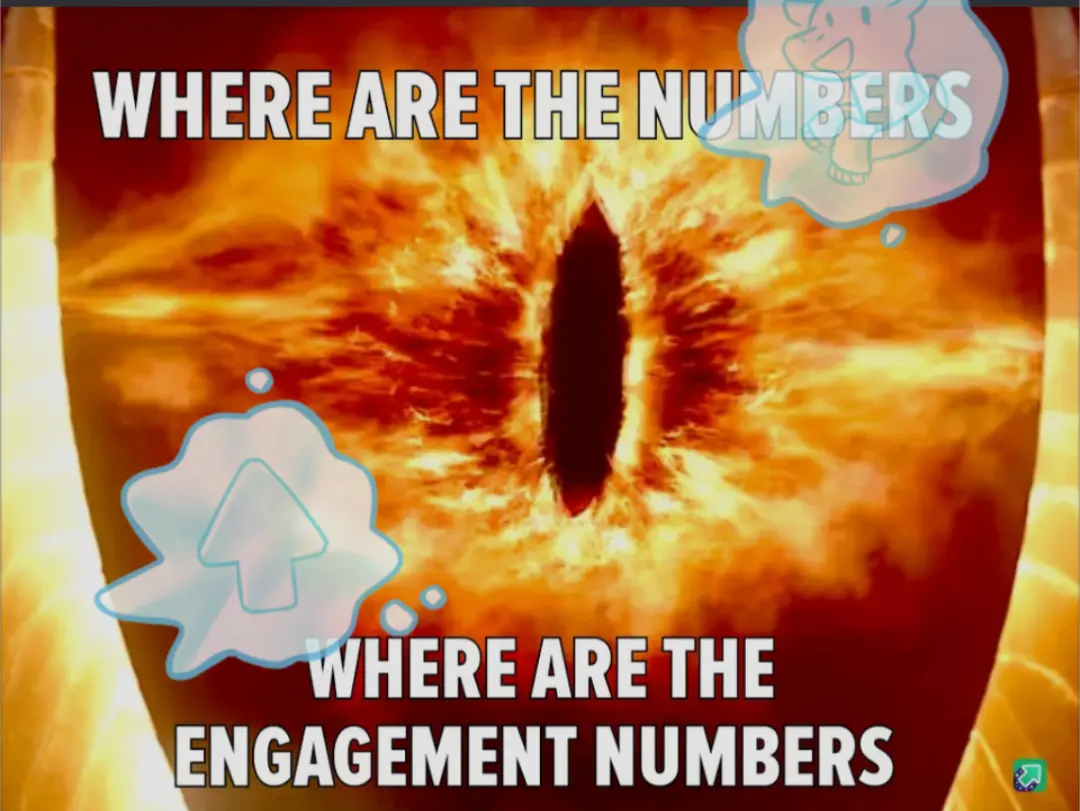 The image shows a fiery, glowing eye, resembling the Eye of Sauron from Lord of the Rings, with two thought bubbles. One…
