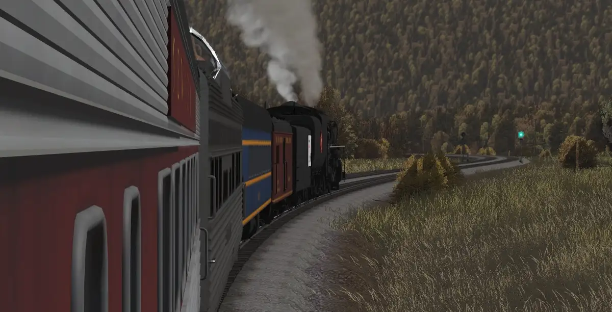 A steam locomotive pulls a passenger train through a forested valley, with smoke billowing from its stack. The image is…