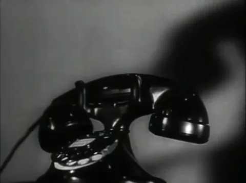 A black-and-white image shows a vintage rotary telephone in three panels. The top row shows the phone without text, while…