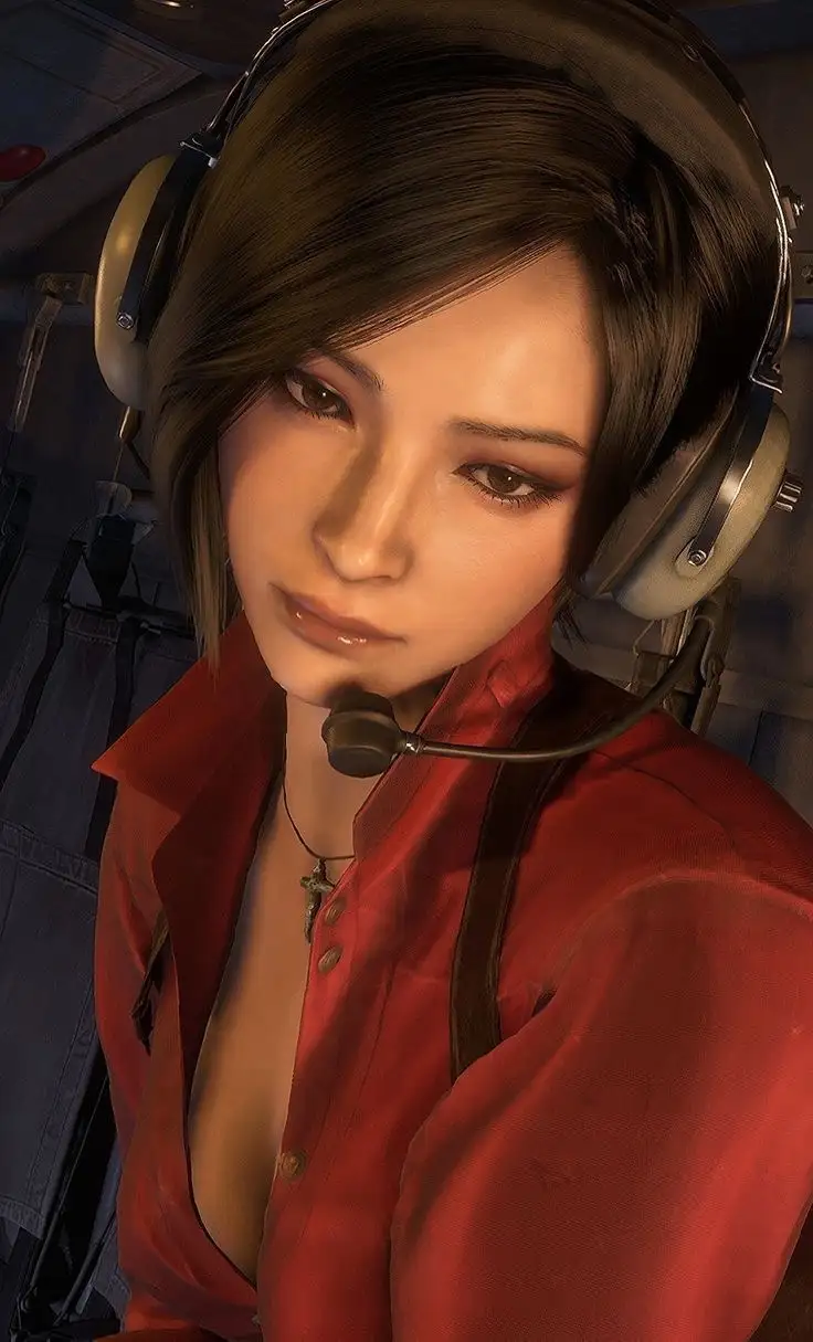 A close-up of a female video game character with brown hair, wearing a headset with a microphone and a red satin shirt…