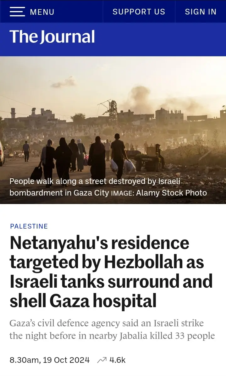 A screenshot of a news article from 'The Journal' shows a photo of people walking through a destroyed street in Gaza City…