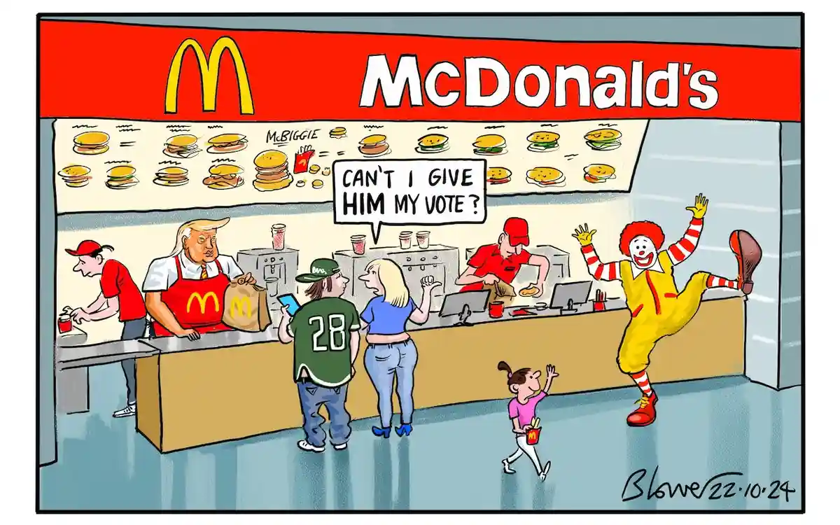 A cartoon depicts a McDonald's restaurant where Ronald McDonald is joyfully leaping on the counter while a customer asks…