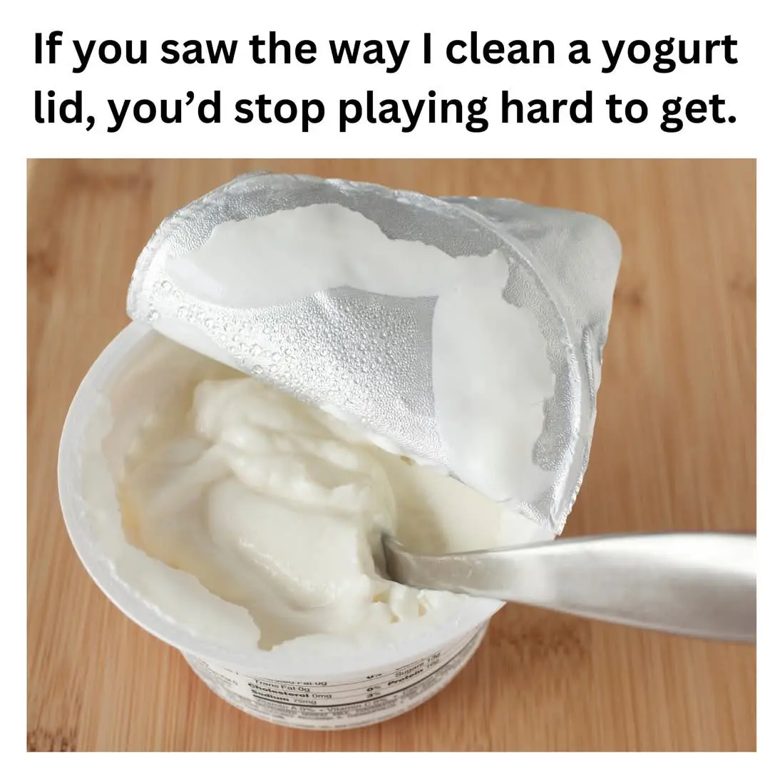 A close-up photo shows a yogurt cup with its foil lid partially peeled back, revealing yogurt inside. The lid is smeared…