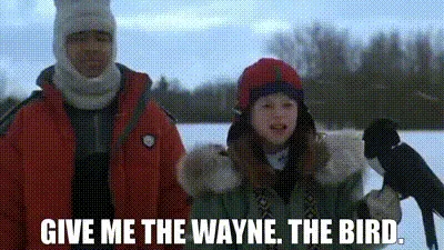 The image is a split-screen meme featuring two panels. The top panel shows two people in winter gear standing outdoors with…