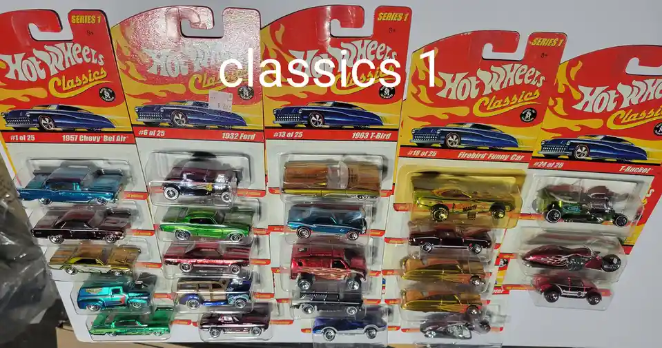 A collection of Hot Wheels Classics Series 1 toy car packages, each containing multiple die-cast vehicles in various colors…