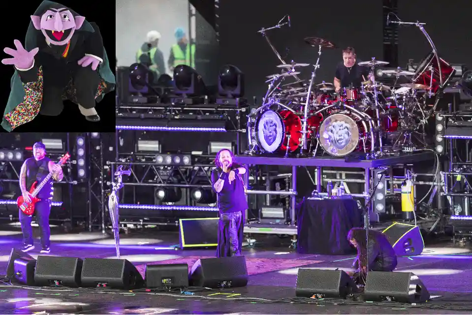 the image is a composite: the main part shows the band metallica performing live on a stage with purple lighting, featuring…