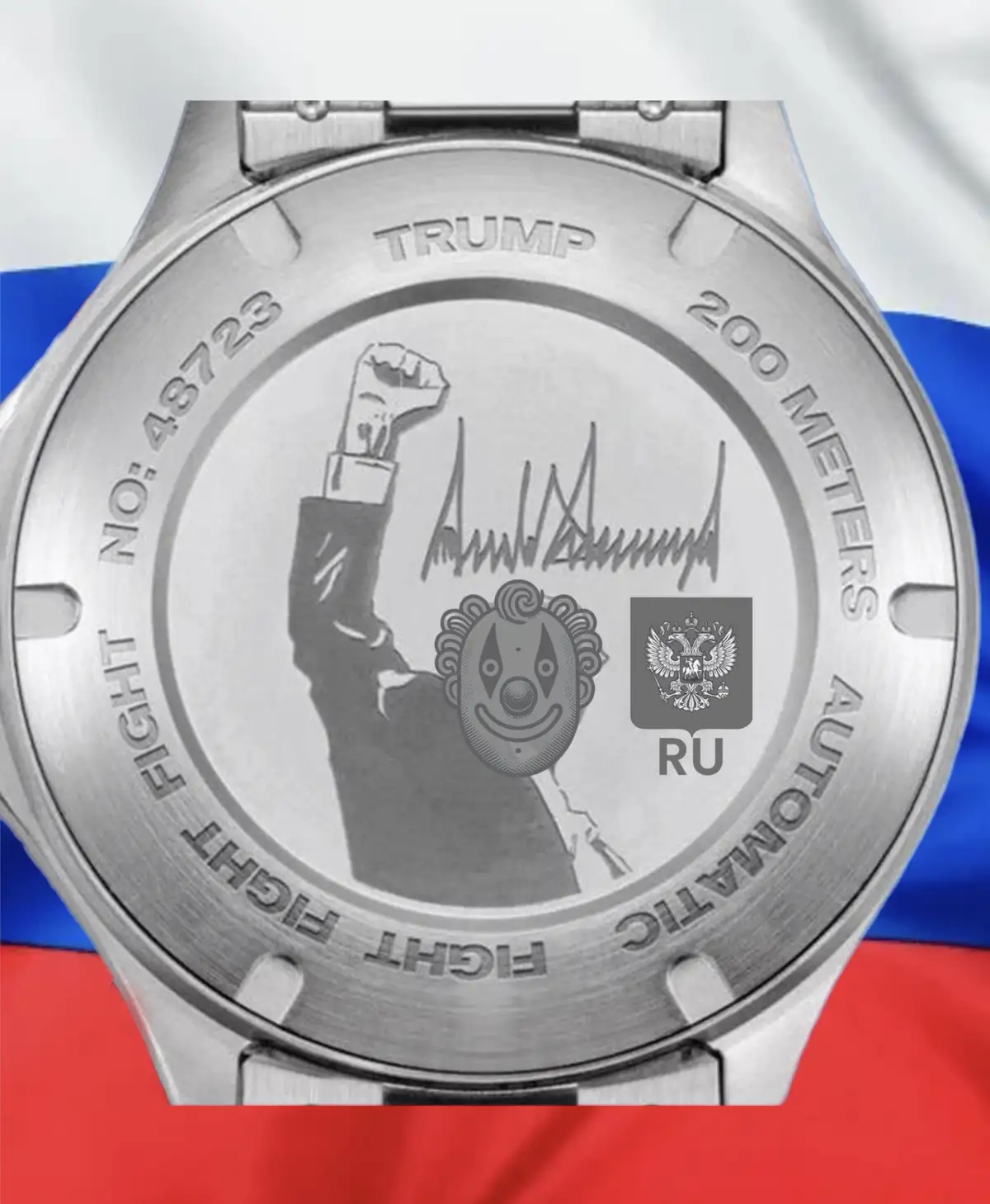 The back of a silver watch engraved with 'TRUMP', '200 METERS AUTOMATIC', and 'FIGHT FIGHT FIGHT FIGHT FIGHT' repeated…