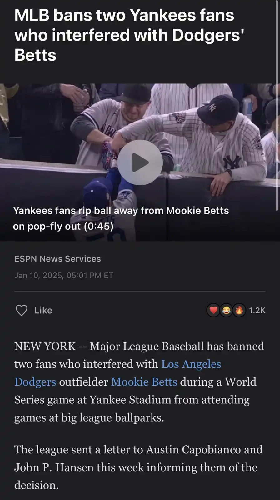 The image shows a screenshot of a news article about two Yankees fans being banned by MLB for interfering with Dodgers…