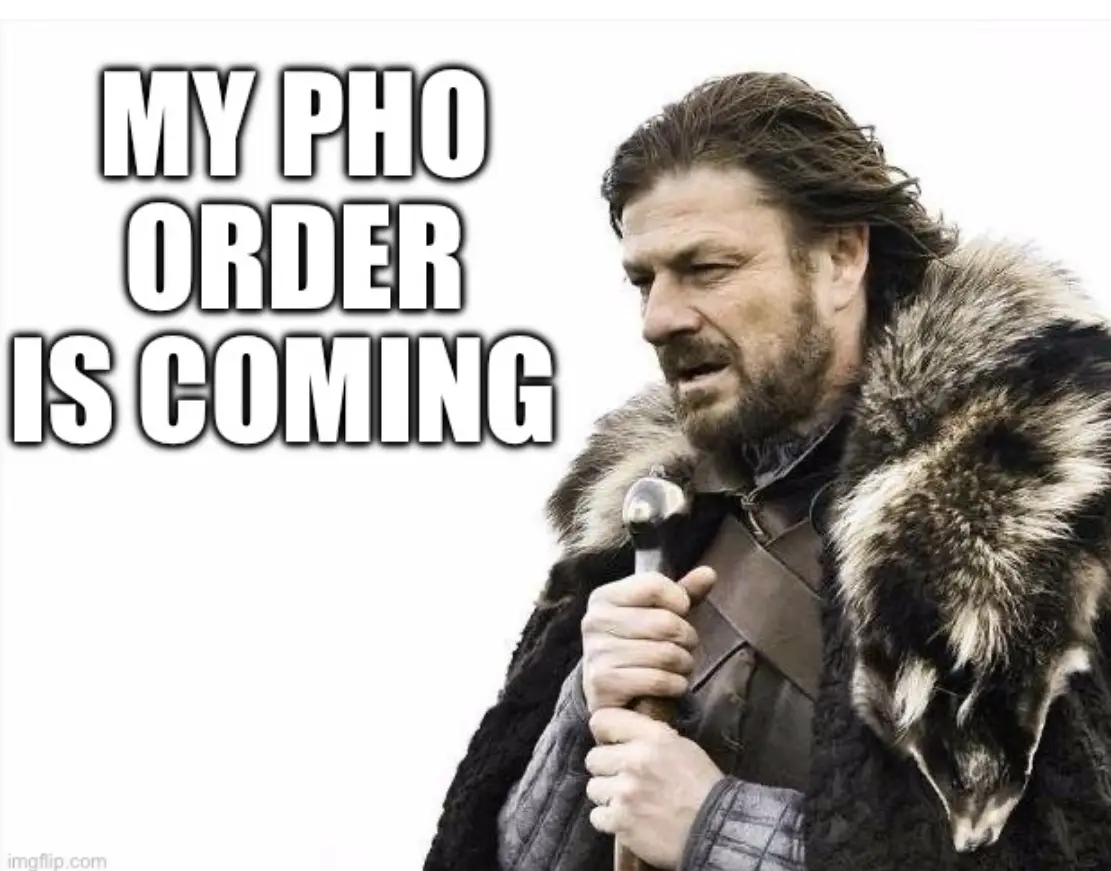 A man with a beard and fur-lined coat holds a staff, looking determined. Large white text reads 'MY PHO ORDER IS COMING'.