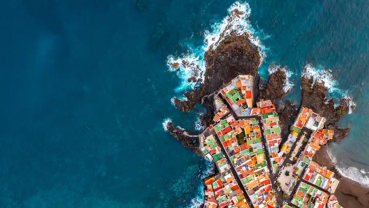 On the Spanish island of Tenerife, coastal settlements ring around the highest mountain, Mount Teide, where the Atlantic…