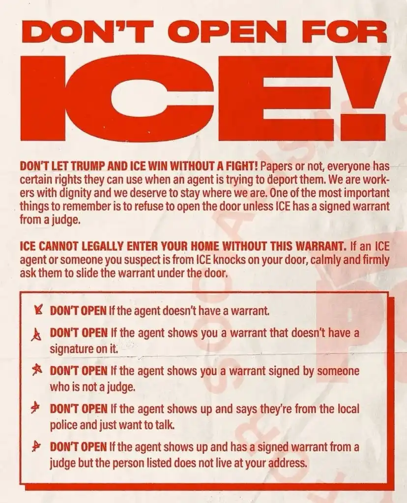A red and white poster with bold text instructing people not to open their doors for ICE agents unless they present a signed…