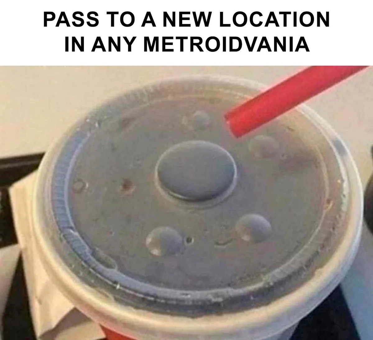 A close-up photo of a plastic drink cup with a clear lid and a red straw, showing condensation droplets on the lid. The text…