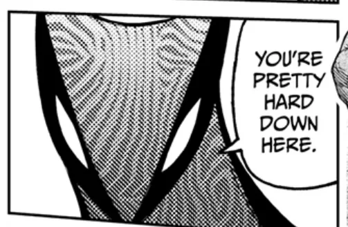 A black-and-white manga panel shows a close-up of a character's torso with a textured, patterned suit. A speech bubble next…