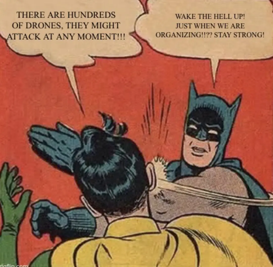 A vintage comic book panel shows Batman grabbing Robin from behind as Robin panics, shouting about hundreds of drones…