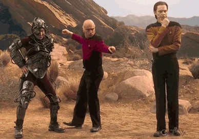 six panels show a scene from Star Trek: The Next Generation where a man in a red shirt performs a dance move while a man in…