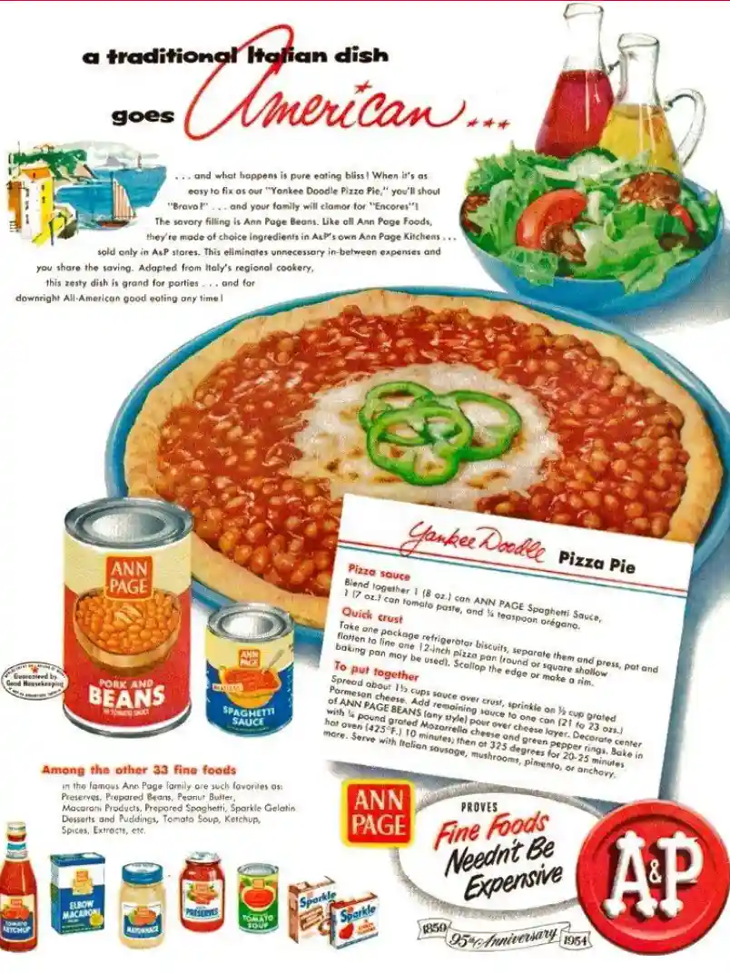 An old-fashioned American grocery ad from 1954 for Ann Page Foods shows a pizza topped with beans and green peppers, labeled…