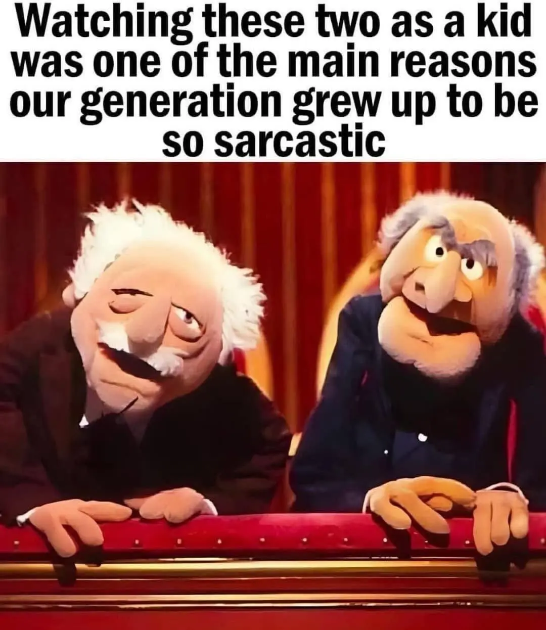 The image shows two elderly puppet characters, Statler and Waldorf from The Muppet Show, leaning over a red railing with a…