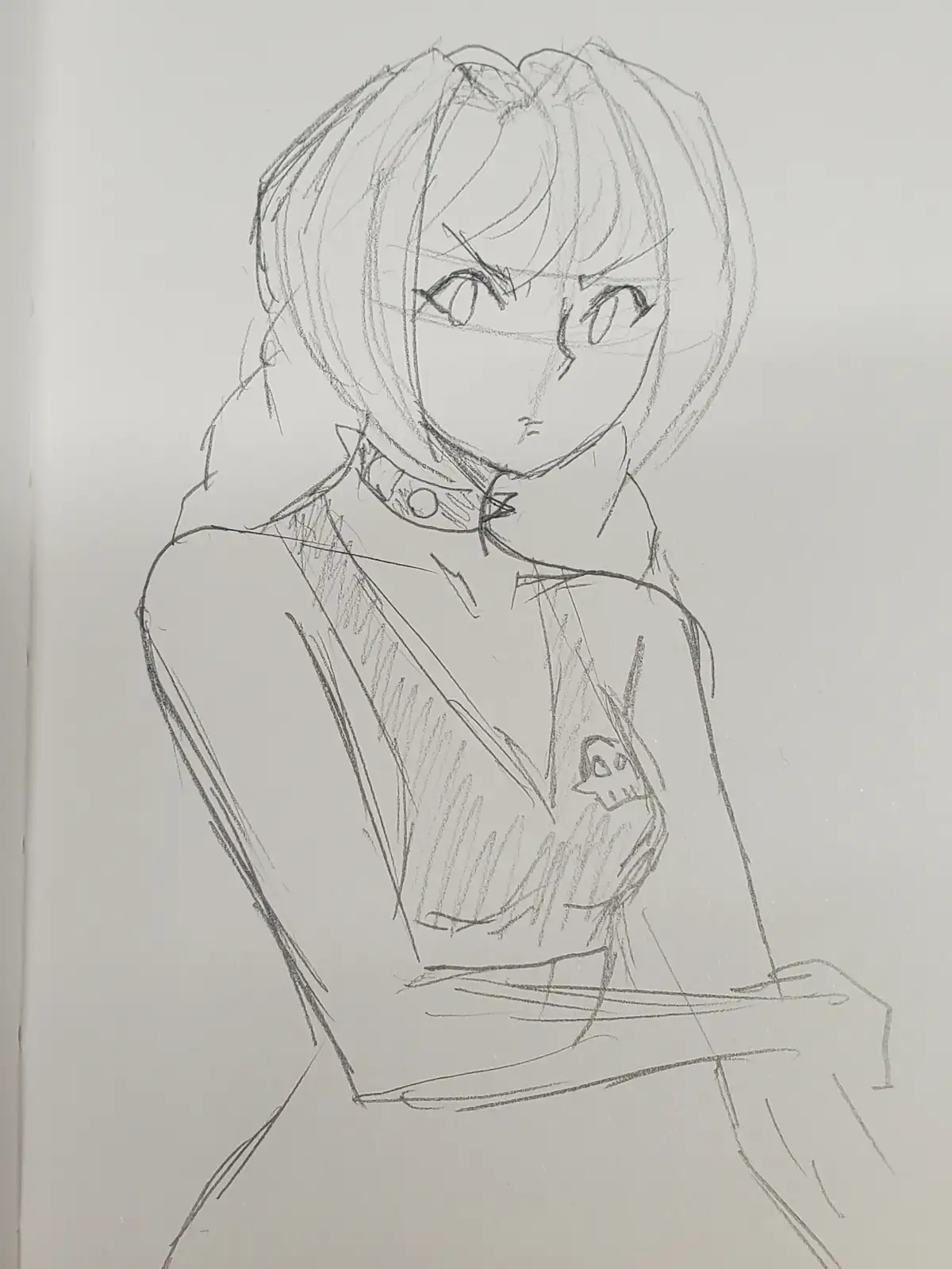 A rough pencil sketch of an anime-style female character with short hair, a choker, and a skull emblem on her chest, looking…