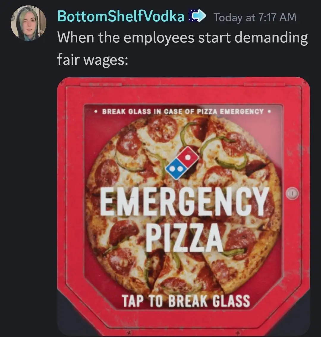 A red, octagonal emergency box with a pizza image inside, featuring the Domino's logo and text reading 'BREAK GLASS IN CASE…