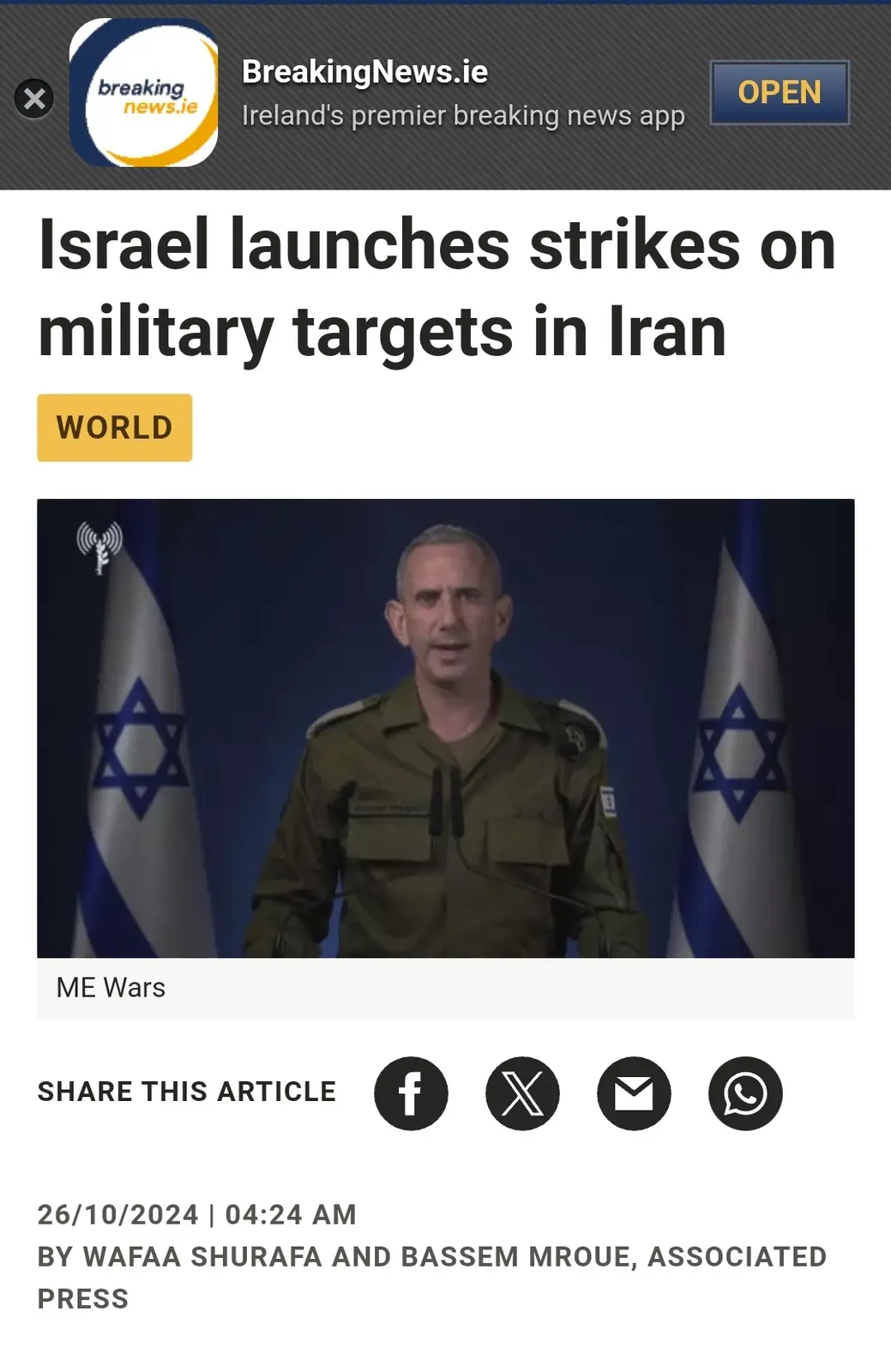 A screenshot of a BreakingNews.ie article from October 26, 2024, shows a headline about Israel launching strikes on military…