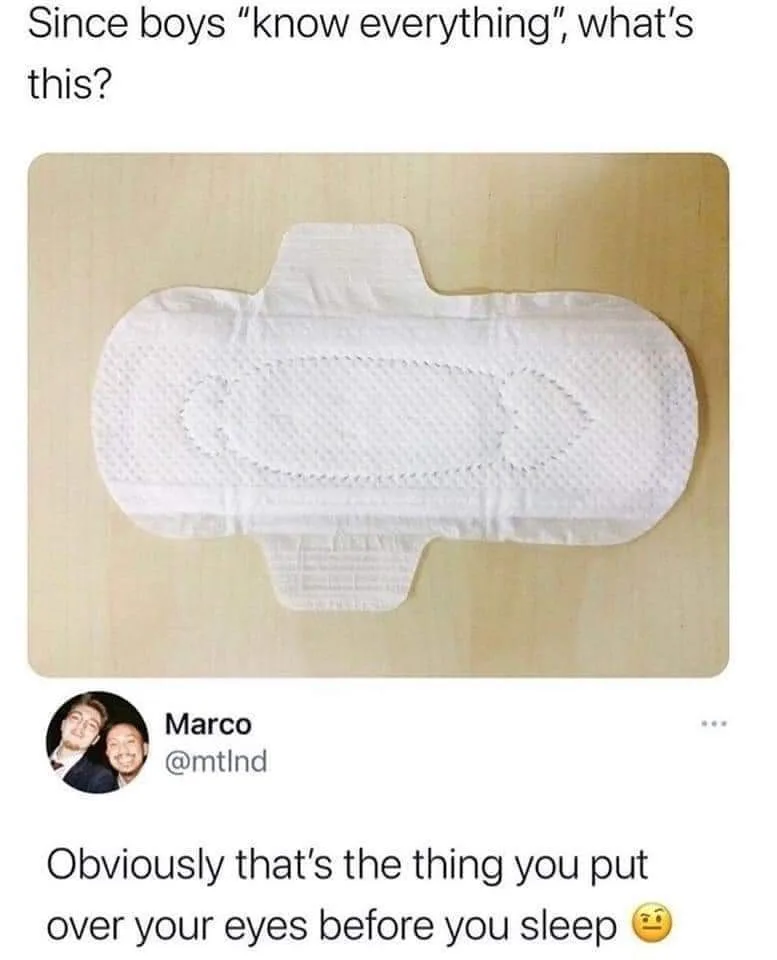 A white sanitary pad is shown lying flat on a light wood surface. Overlaid text asks, 'Since boys "know everything", what's…