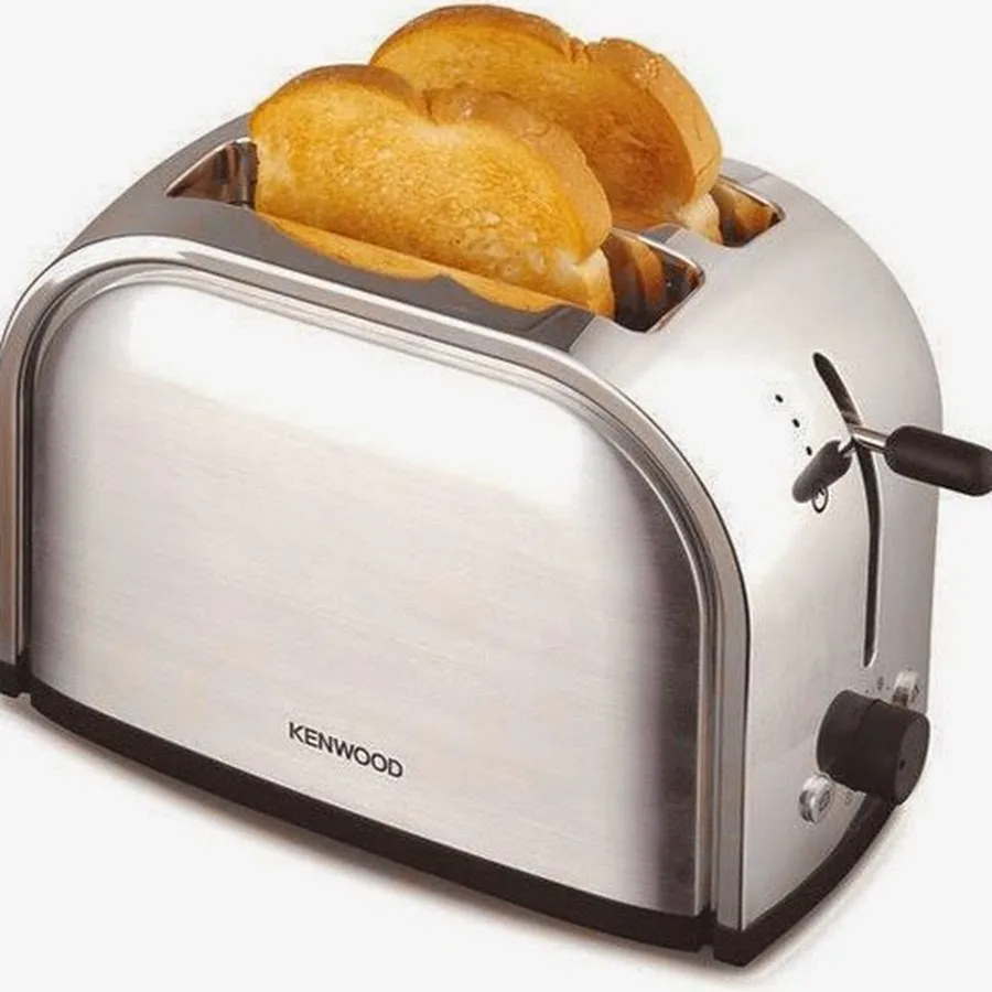 A silver Kenwood toaster with two slices of golden-brown toast popping out of the slots, with the text 'toasted bread'…