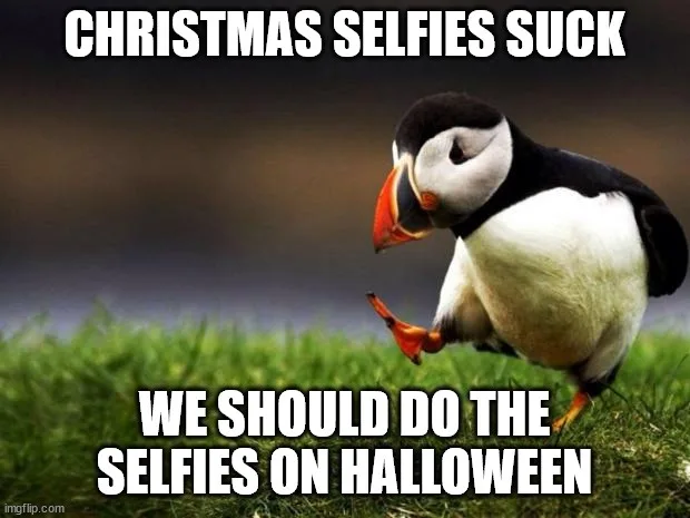 A penguin stands on grass with its head tilted down and one foot lifted, conveying a look of disdain. The text overlaid on…