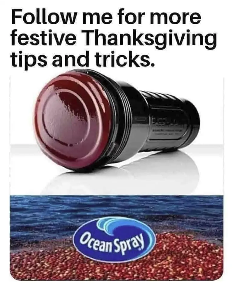 The image shows a black and red Ocean Spray cranberry juice bottle lying on its side on a white surface, with the Ocean…