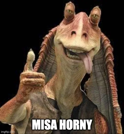 A close-up image of the fictional character Jar Jar Binks from Star Wars, smiling widely with his tongue sticking out and…