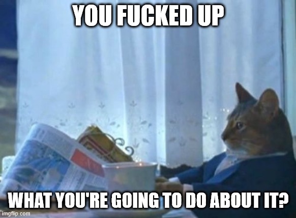 A cat wearing a dark suit sits at a table reading a newspaper, looking over its shoulder with a stern expression. White bold…